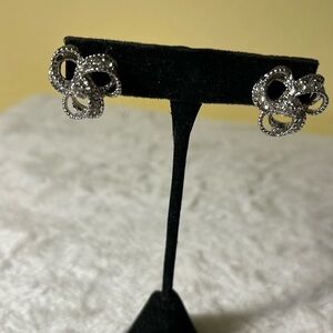 Earrings, silver tone, three sections like a knot rhinestones silvery parts #319